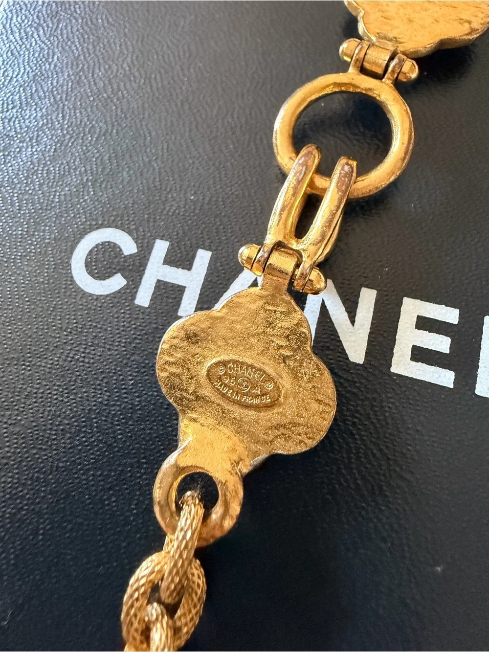 CHANEL Gold and White Oval CC Pendant Necklace